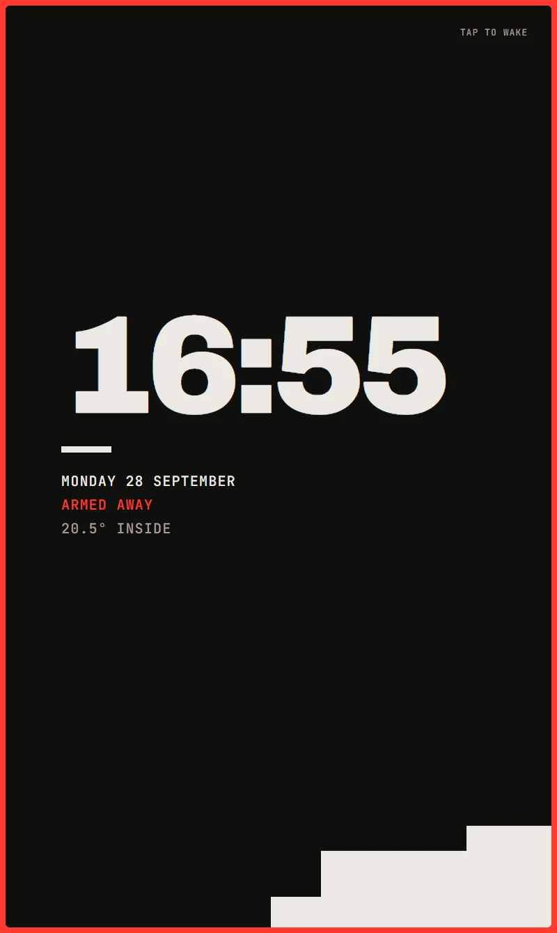 Night screensaver: a large clock, the date, 'Armed away' in red and a red frame round the screen